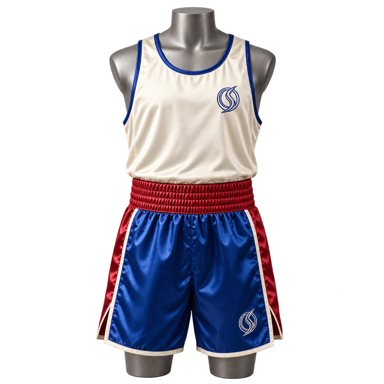 Cream boxing vest and cobalt and crimson satin trunks on a mannequin