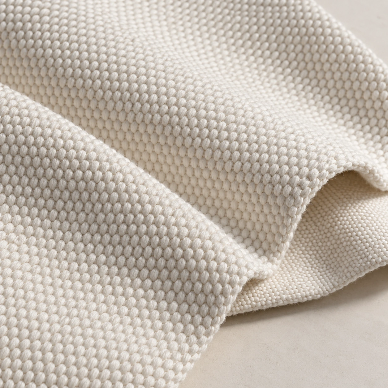 Representative gi pearl-weave textile texture; generated illustration.