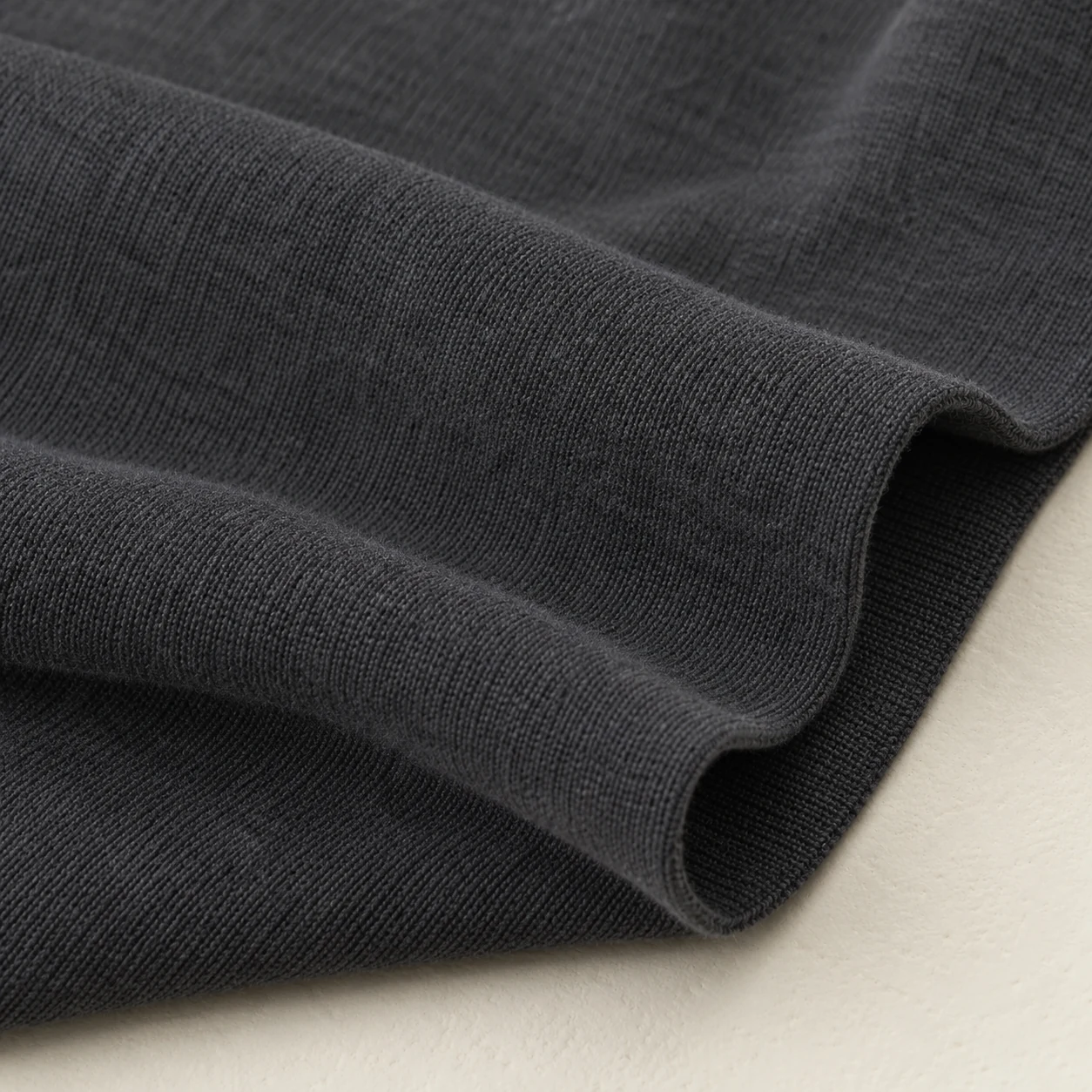 Representative nylon/elastane stretch knit texture; generated illustration.