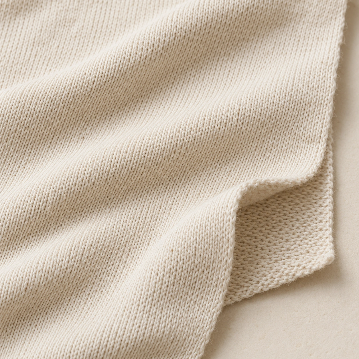Representative cotton / cotton-blend jersey texture; generated illustration.