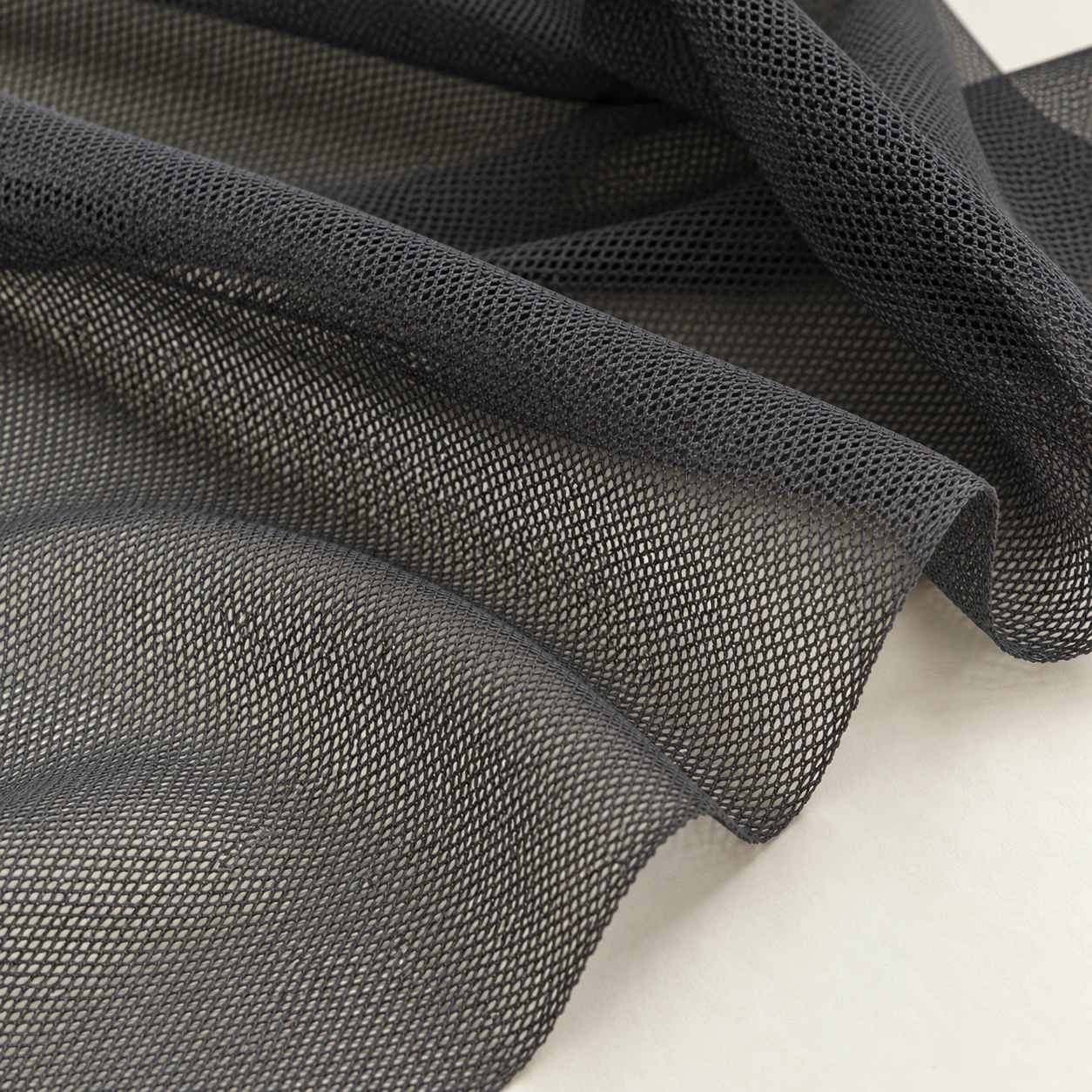 Representative power mesh / stretch lining texture; generated illustration.